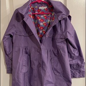 Girls purple raincoat with detachable hood.size 7
